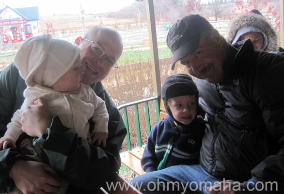 Mooch and Farley ride a freezing train ride with their dad and Grampy at Vala's Pumpkin Patch.