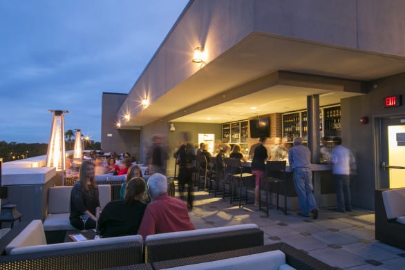 Don't you just want to end your day at a rooftop bar like this? Not with kids you don't. 