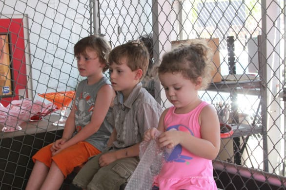 The kids eventually scooted up closer to the front of the bleachers to get a better view of the glass blowing.