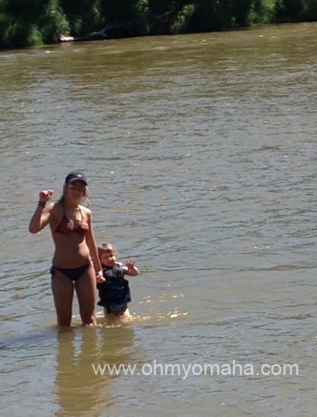 Mooch out in the river with her cousin.