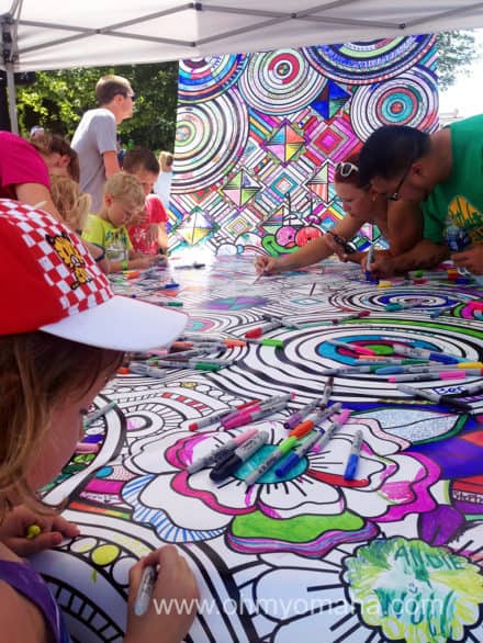 The Des Moines Arts Festival had some interactive opportunities for all ages, including this giant community arts project.
