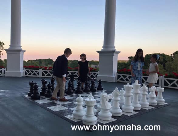 Oversized chess set on patio of Grand Hotel