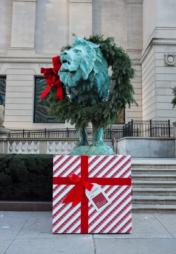 The lion statues in front of the Art Institute of Chicago get a holiday makeover each year. 