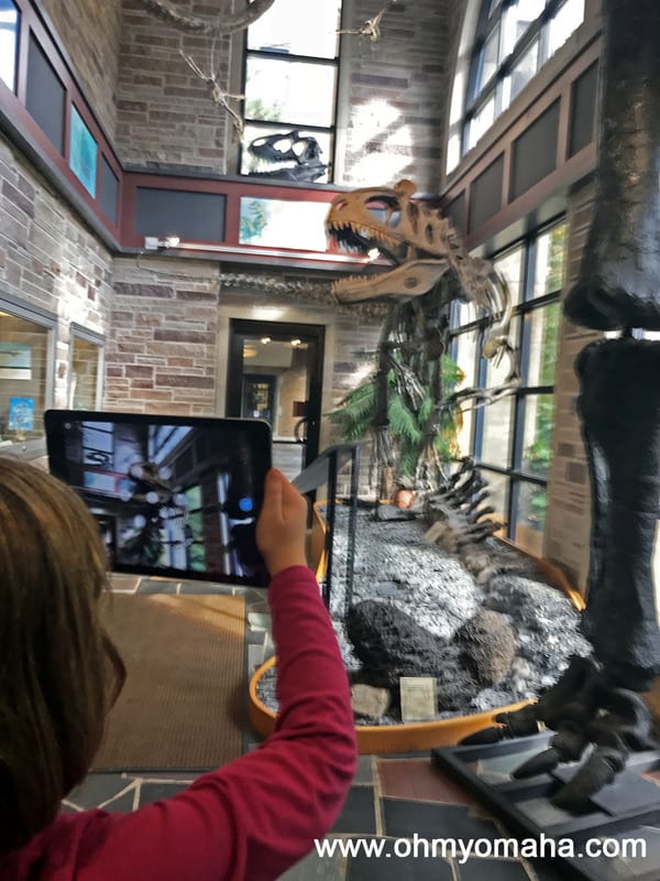 Viewing fossils with a special iPad app at Fryxell Geology Museum in Rock Island, Illinois