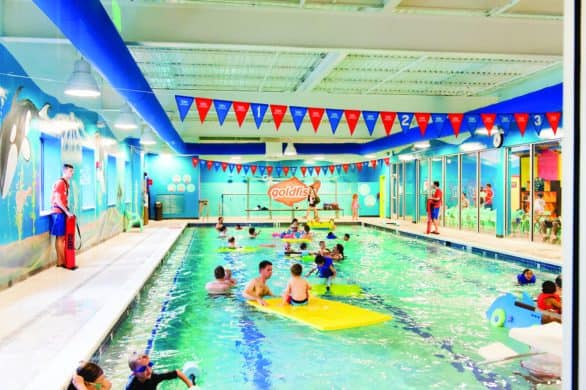 Families playing at Goldfish Swim School during a Family Swim