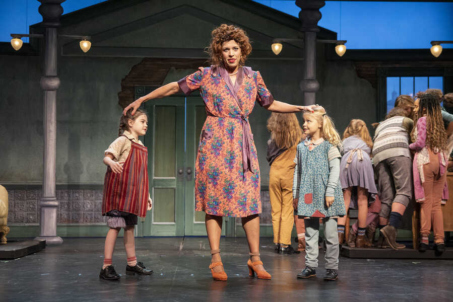 Allison Wissman, center, is Miss Hannigan in the Omaha Community Playhouse production of 