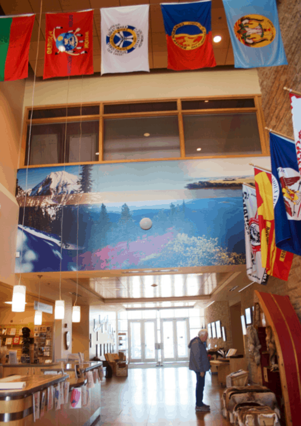 A man looks at an exhibit inside the Lewis & Clark National Historic Trail Headquarters and Visitor Center