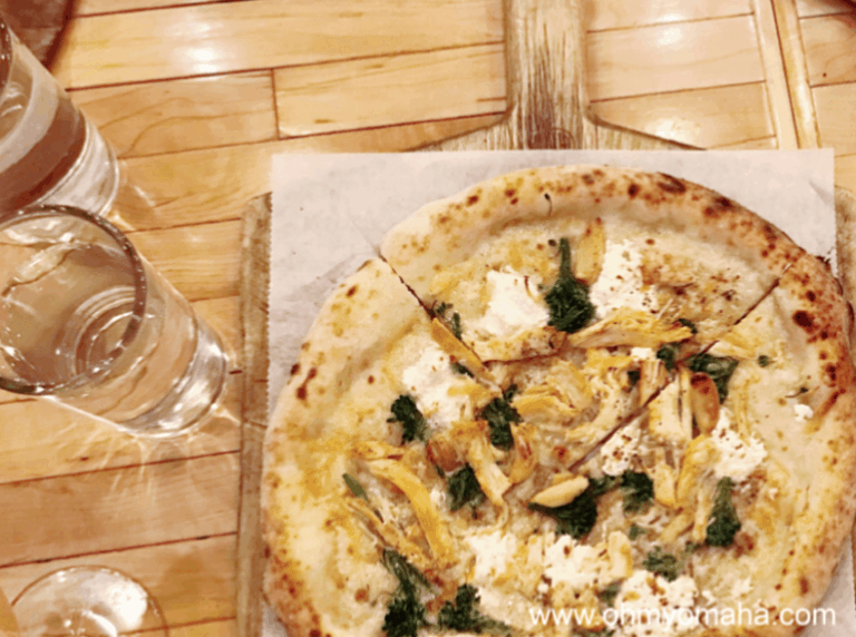 Overhead photo of wood-fired pizza at Via Farina