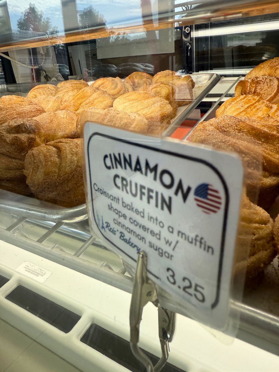 Up-close photo of cinnamon cruffins, a hybrid of a croissant and muffin, at Reis' Bakery