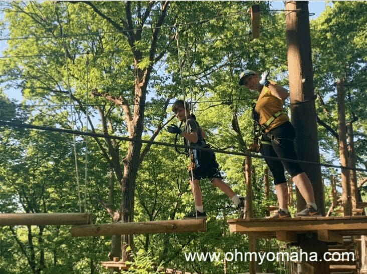 Kim and her son on the TreeRush Adventures course