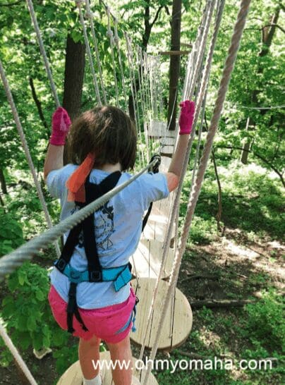 Girl on a TreeRush Adventures obstacle