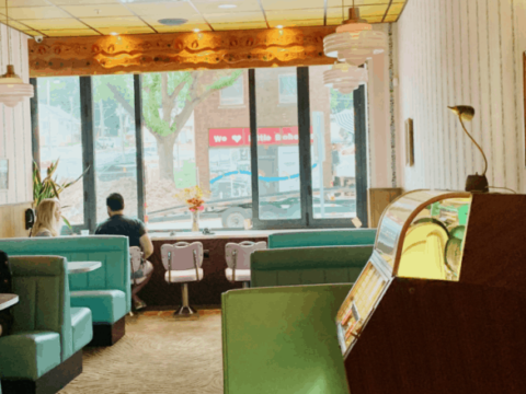 Jukebox and booths in the dining room of Fizzy's