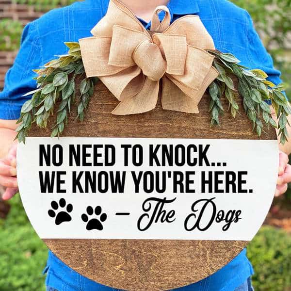 Cute door hanger available through Knotty Dogs Decor