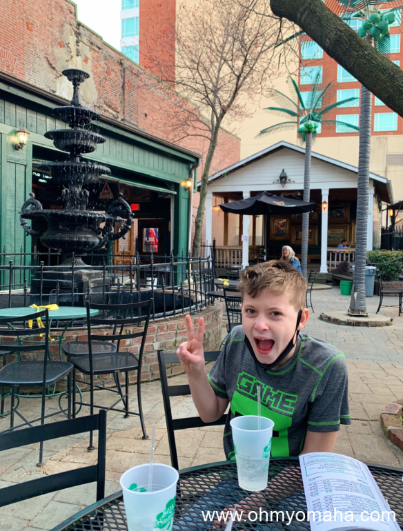 My son sitting at a table at the Silky O'Sullivan's patio on Beale Street.