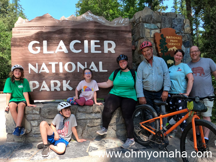My family in front of the Glacier National Park sign at the West Glacier entrance.