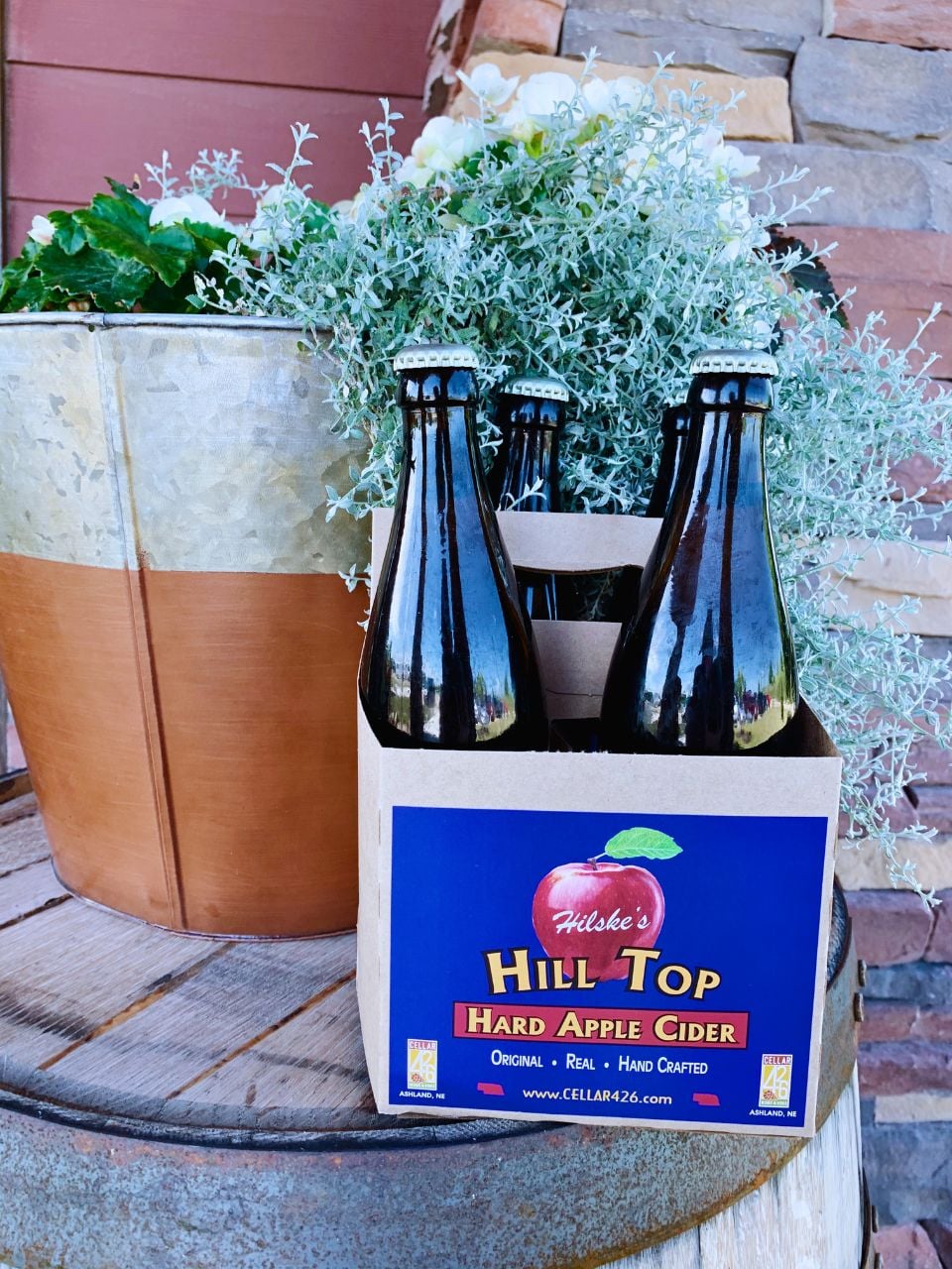 A four pack of hard apple cider from Cellar 426 Winery