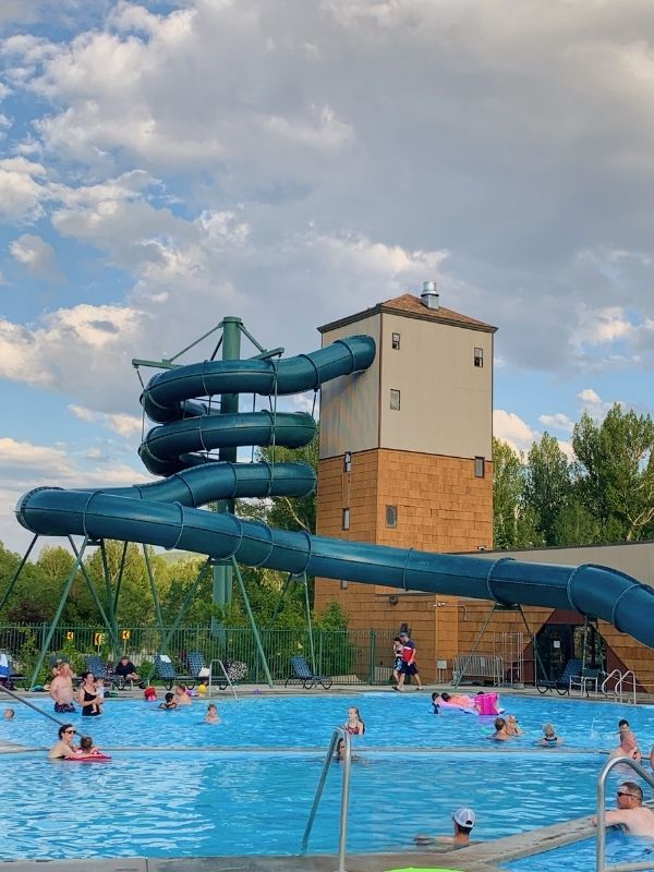 The slide and outdoor pools at Fairmont Hot Springs Resort