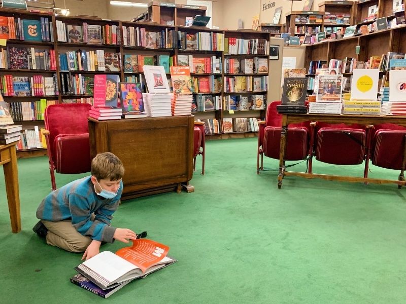 Browsing through books at Tattered Cover Bookstore