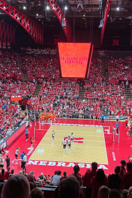 The crowded arena at a UNL Women's volleyball match