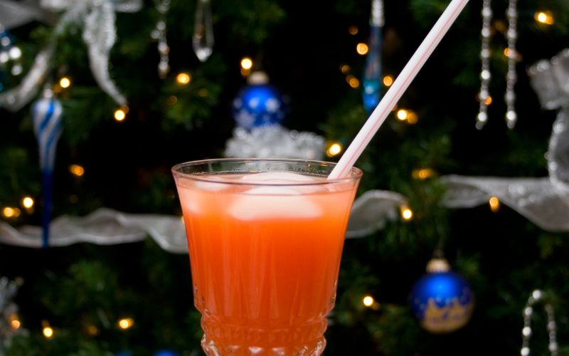 Cocktail by a Christmas tree