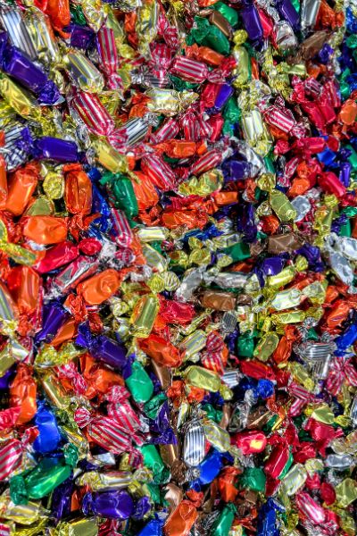 Chocolate meltaways in bright colored candy wrappers at Bakers Candies in Nebraska