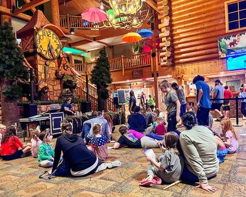 Families gather in the Great Wolf Lodge lobby to play bingo