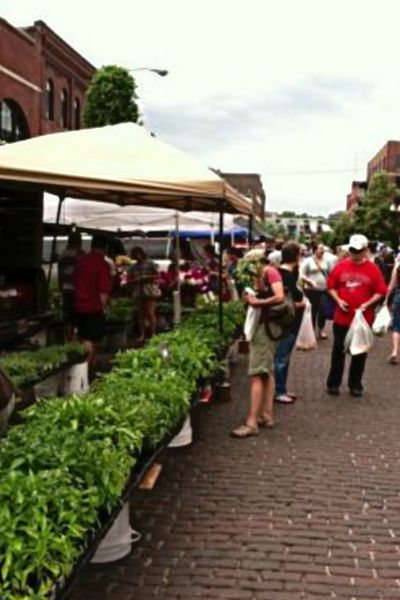 Vendors at the Old Market Farmers Market line the brick road of 11th Street