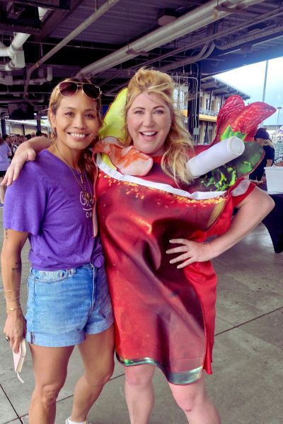 Dee poses with a friend who is wearing a Bloody Mary costume