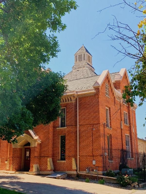 The red brick exterior of Squirrel Cage Jail, a building that many say is haunted