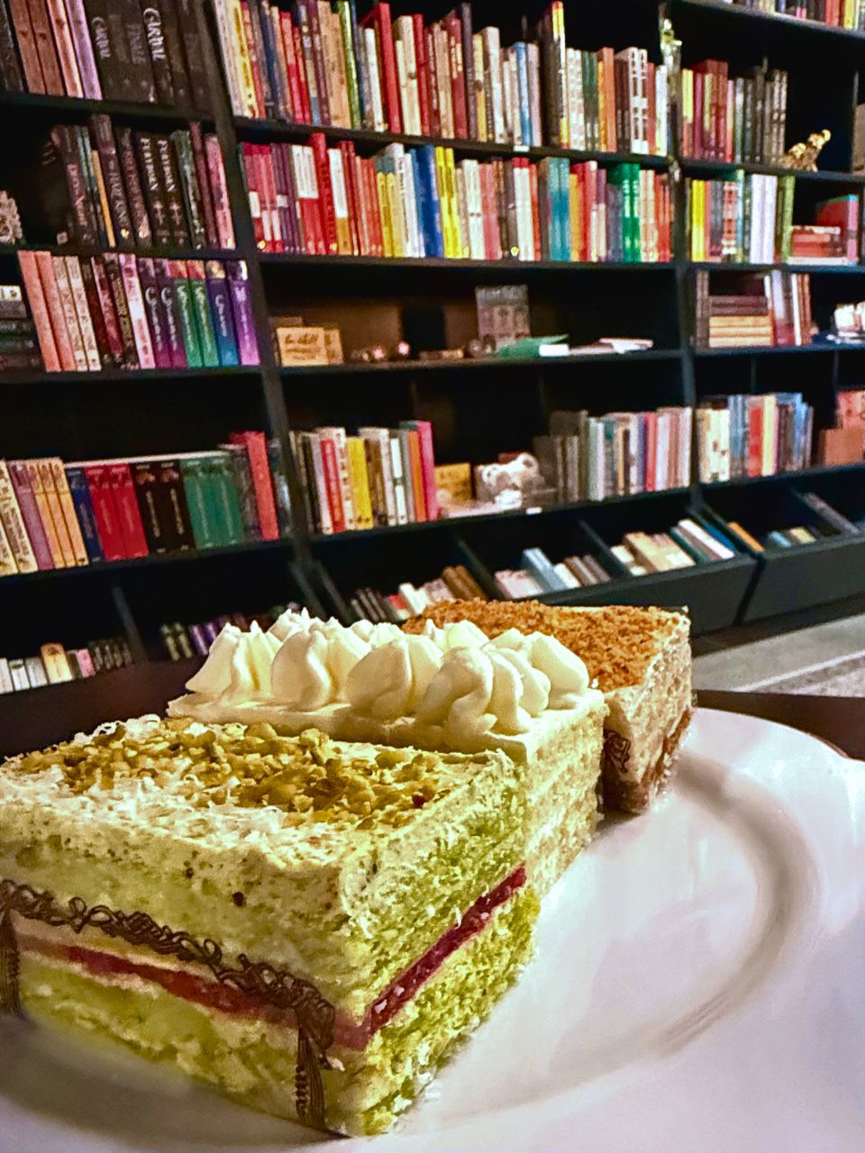 Three cakes on a plate at The Wandering Page