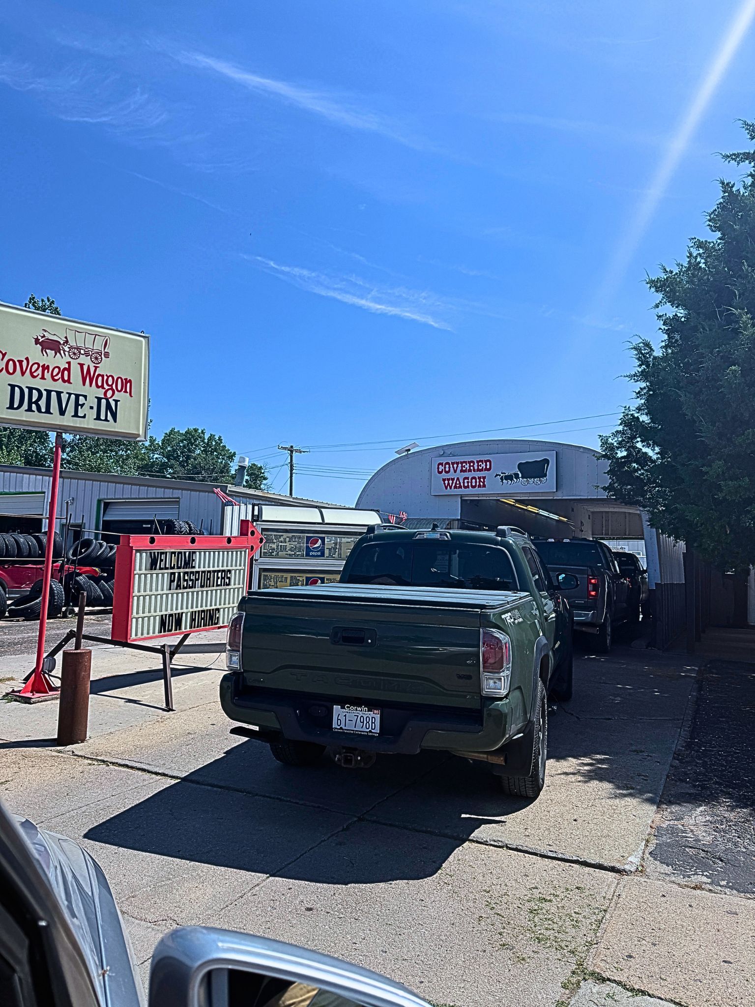A line of cars wait at the Covered Wagon Drive-In in Gordon, Nebraska