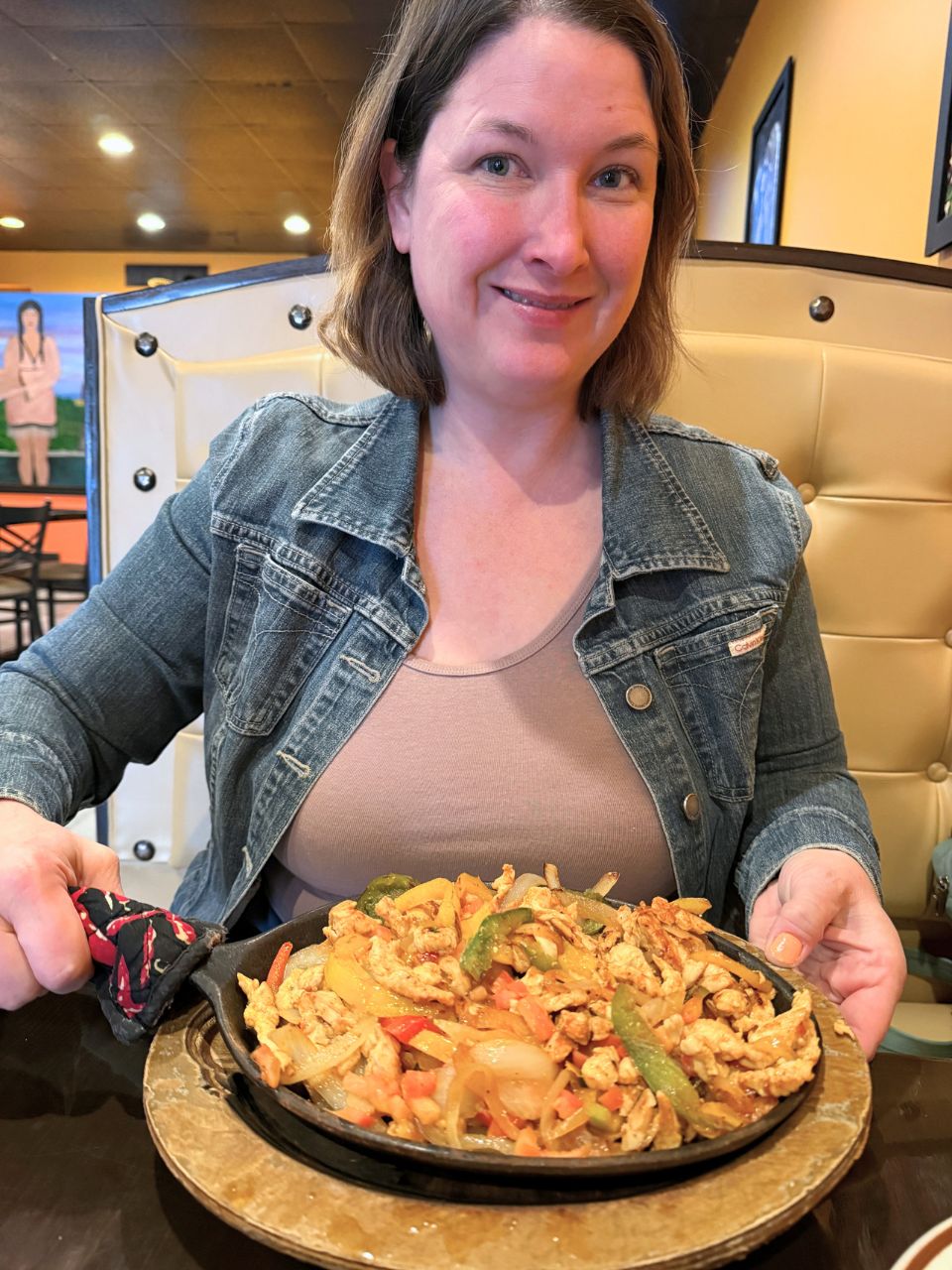 Kim and the huge portion of fajitas at El Amigo in Pocahontas, Iowa